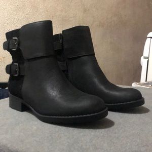 Size 6.5 heel/boots black outside suede feel.